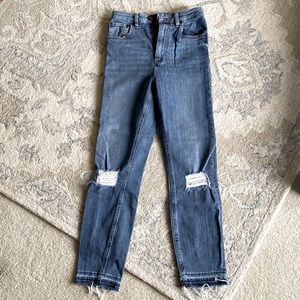 Mid rise distressed skinny jean from ASOS. Size 26